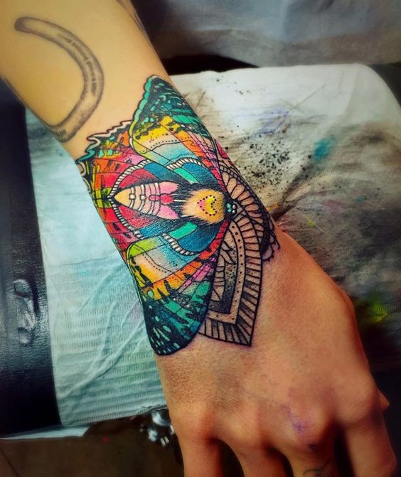 Bold and Bright Moth Tattoo