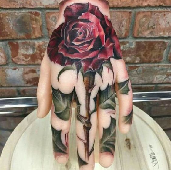 Bold Colour Rose Hand Tattoo