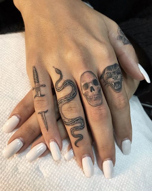 Intricate Finger Tattoos