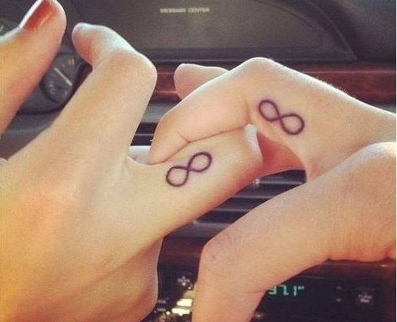 matching finger tattoos