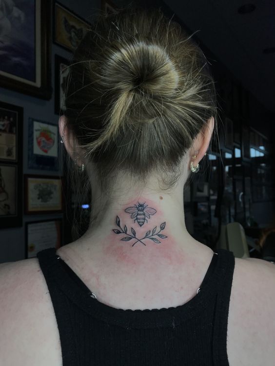 Bee-back-of-neck-tattoo