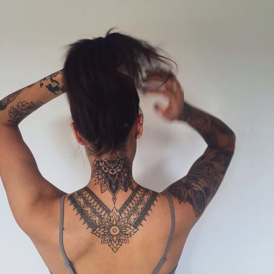 Mandala back of neck tattoo
