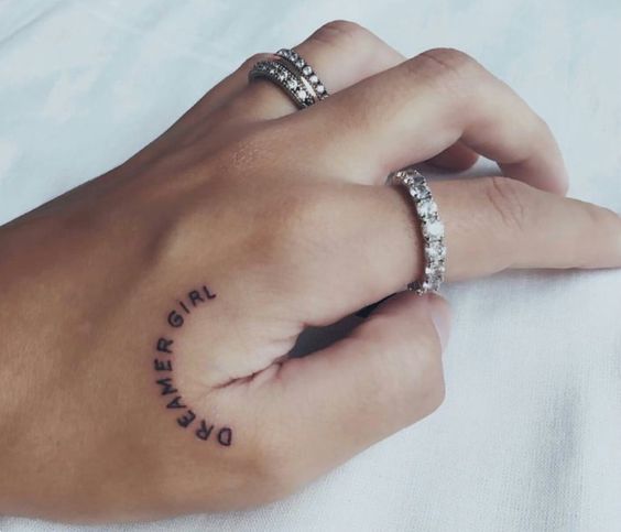 dreamer girl hand tattoo