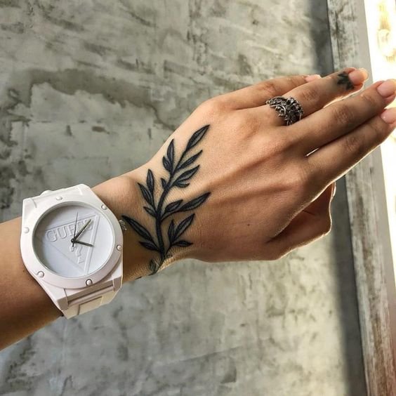 White Fern Leaf Tattoo On Hand