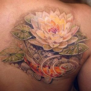 Fish-Lotus-Tattoos-For-Girls