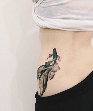 Cute rib tattoos for girls