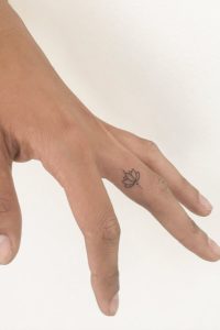Small-Lotus-Finger-Tattoos