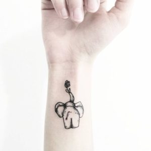 Back-Small-Elephant-Tattoo-Designs