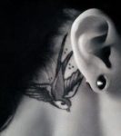 bird-behind-the-ear-tattoo