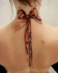 bow-back-of-neck-tattoo