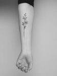 delicate-daisy-flower-tattoo