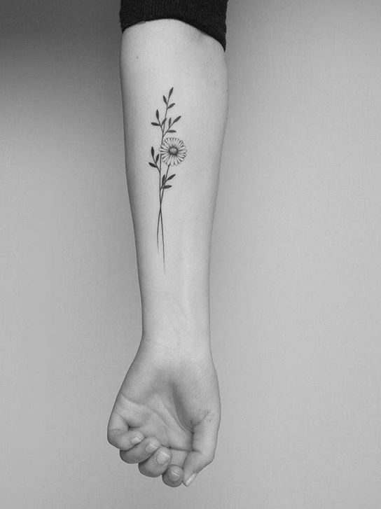 Tattoo of a daisy