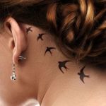 five-birds-behind-the-ear-tattoo