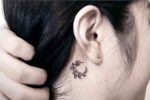 flower-moon-behind-the-ear-tattoo