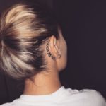 numerals-behind-the-ear-tattoo