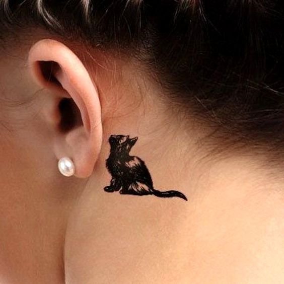 Cat Playing With Heart Tattoo On Behind Ear