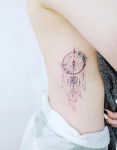 Dream Catcher Flowers and Feathers Tattoo